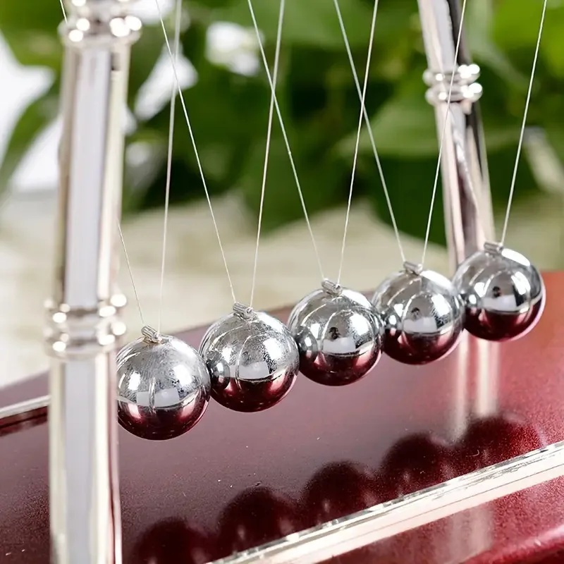 مهد نيوتن للكرات الفولاذية الم - مراجعة Newton Cradle Large وسعره